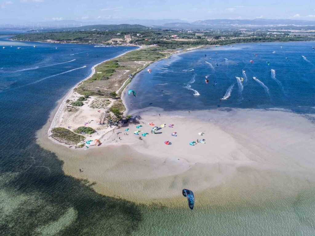 Learn to kitesurf in Punta Trettu, the Best Kite Beach of Sardinia